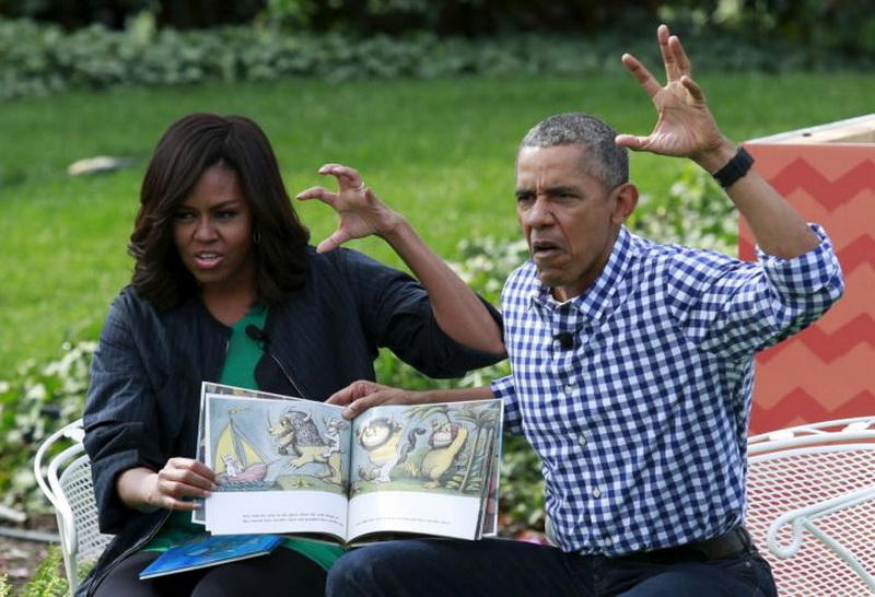 U.S. President Barack Obama and first lady Michelle Obama perform a reading of the children's book 