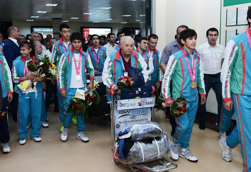 Азербайджанских олимпийцев в Баку встретят как героев
