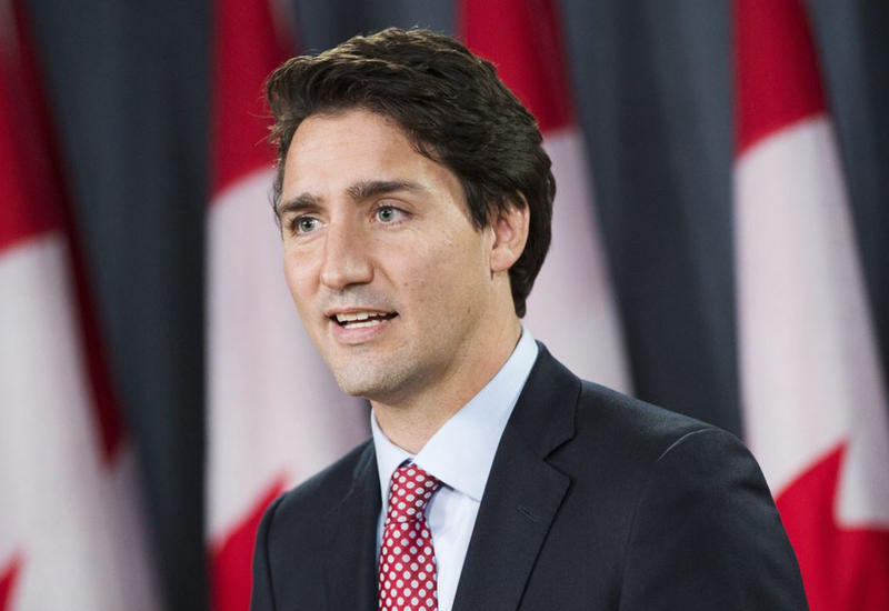 Премьер-министр Канады провел встречу с избирателями в бронежилете