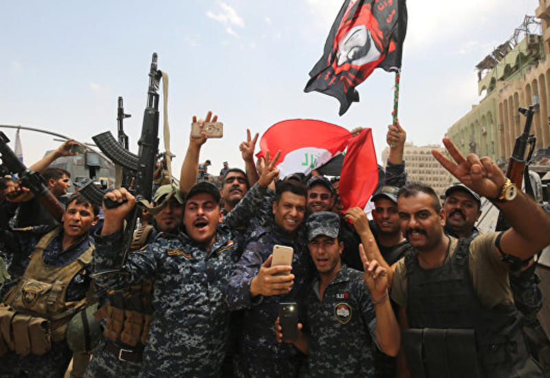 Военные подняли флаг Ирака у реки Тигр на исторической части Мосула