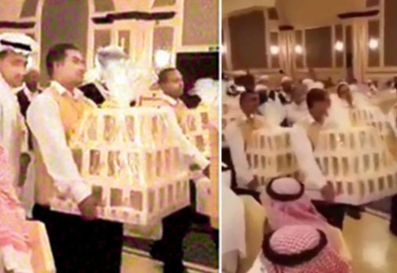 Aрабский жених устроил грандиозную раздачу iPhone 8 на своей свадьбе