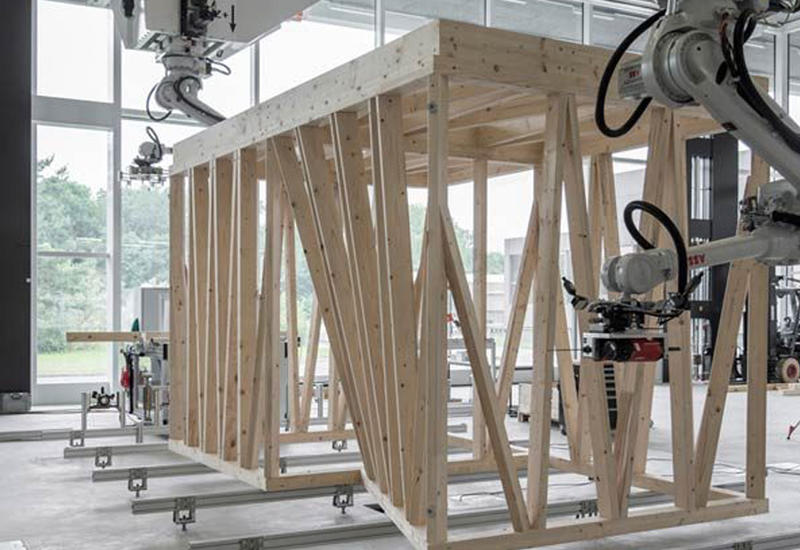 Робот заменит бригаду строителей при возведении деревянных построек