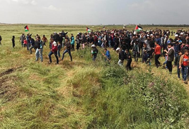 В столкновениях на границе сектора Газа пострадали десятки палестинцев
