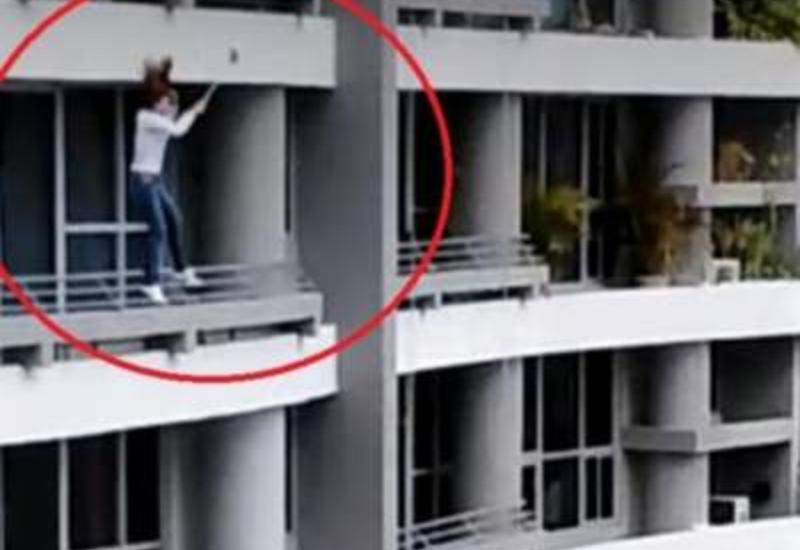 Женщина свалилась с 27-го этажа, делая селфи