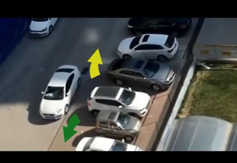 Заблокированный водитель виртуозно выехал с парковки