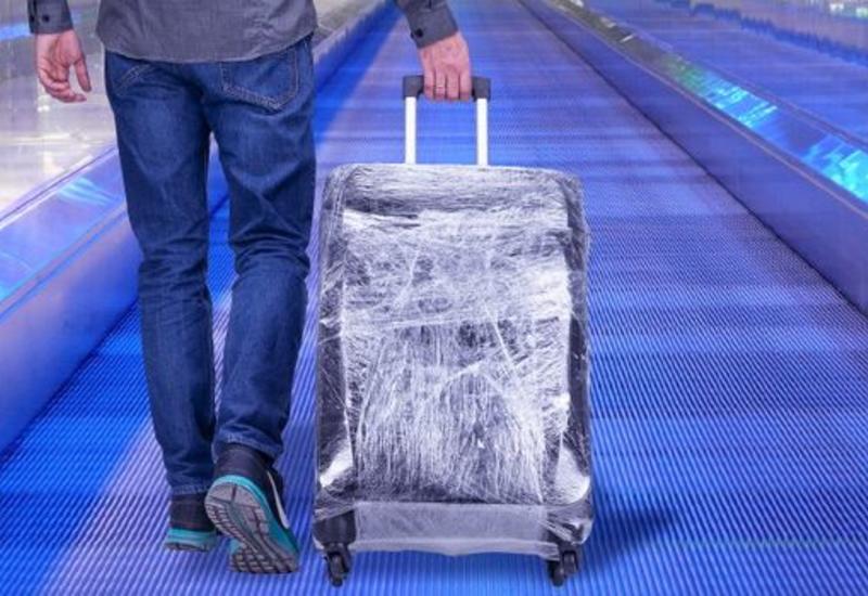 Почему не стоит обматывать чемодан пленкой?