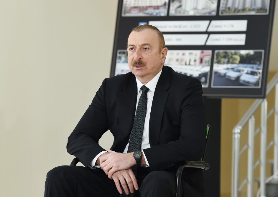 Президент Ильхам Алиев принял участие в церемонии предоставления квартир семьям шехидов и инвалидам войны в бакинском поселке Рамана