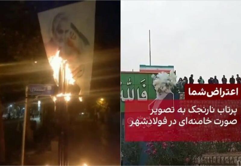 В Иране демонстранты сожгли баннеры с изображениями Хаменеи и Касема Сулеймани