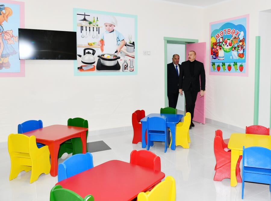 Президент Ильхам Алиев принял участие в открытии яслей-детского сада, построенного в Огузе по инициативе Фонда Гейдара Алиева