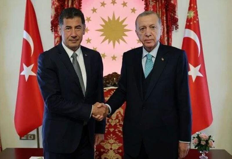 Проходит встреча между Эрдоганом и Синаном Оганом