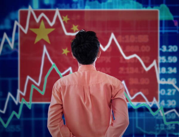 Пекин вводит ограничение на торговлю акциями