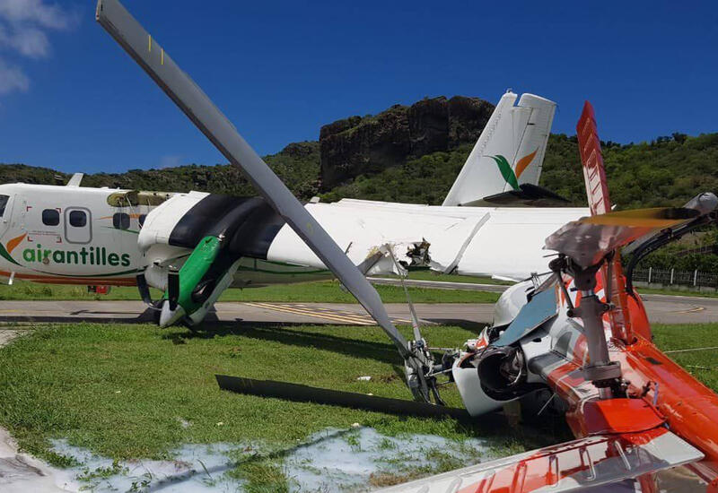 Самолет врезался в вертолет при посадке в аэропорту