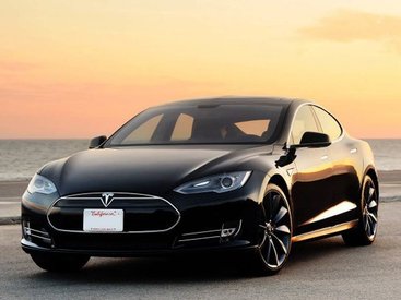 Владельцы Tesla Model S поделятся друг с другом электричеством - ФОТО